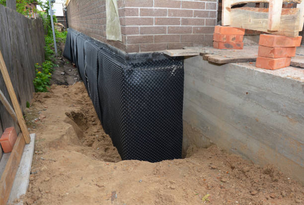 Happy homeowners after waterproofing job in Port Reading